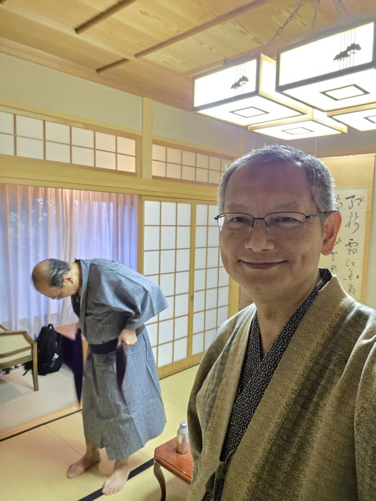 Putting on Japanese Yukata - Getting ready to enjoy our first onsen on Day 1