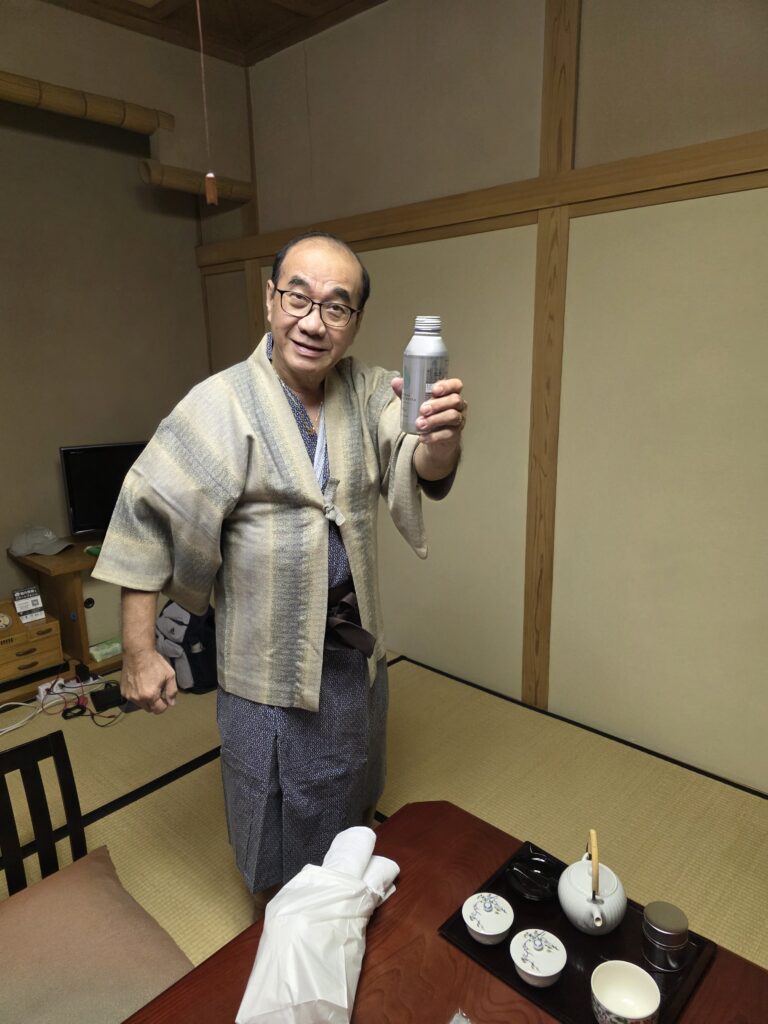 Putting on Japanese Yukata - Getting ready to enjoy our first onsen on Day 1