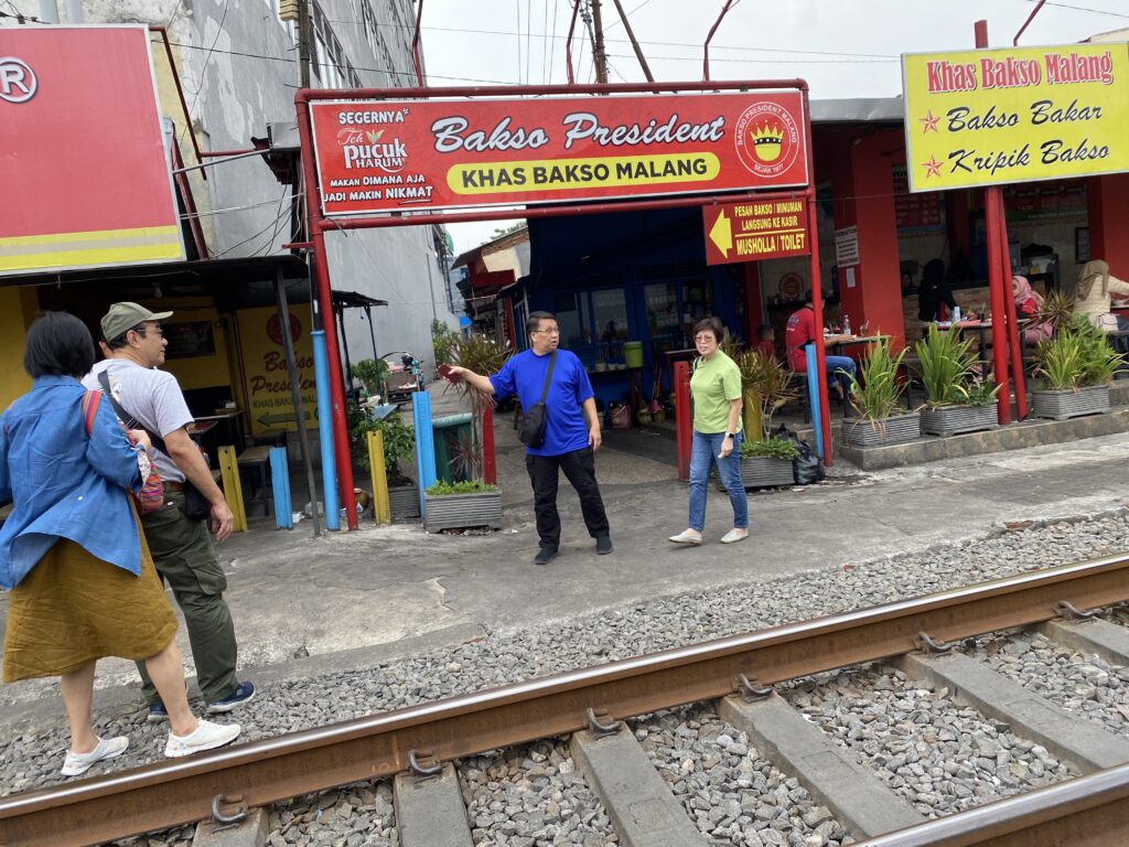 Bakso Malang President for lunch next to railway track