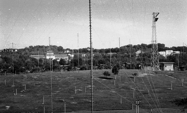 Aerial masts standing in the field at 14 and a half miles Upper Jurong Road