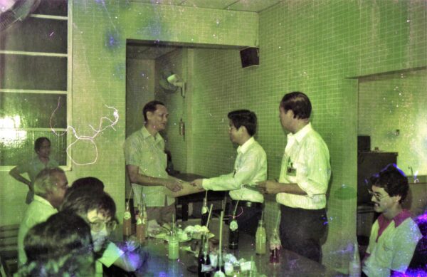 1974 - Woon Khai Boon receiving an award