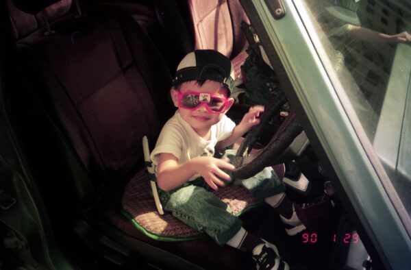 1990 - Getting ready for Chinese New Year Reunion Dinner - Eric at driving wheel