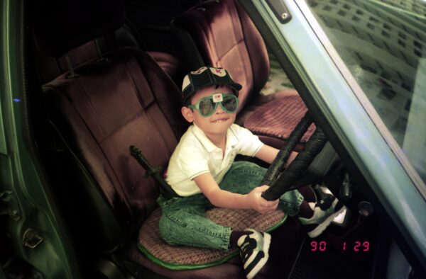 1990 - Getting ready for Chinese New Year Reunion Dinner - Derrick at driving wheel